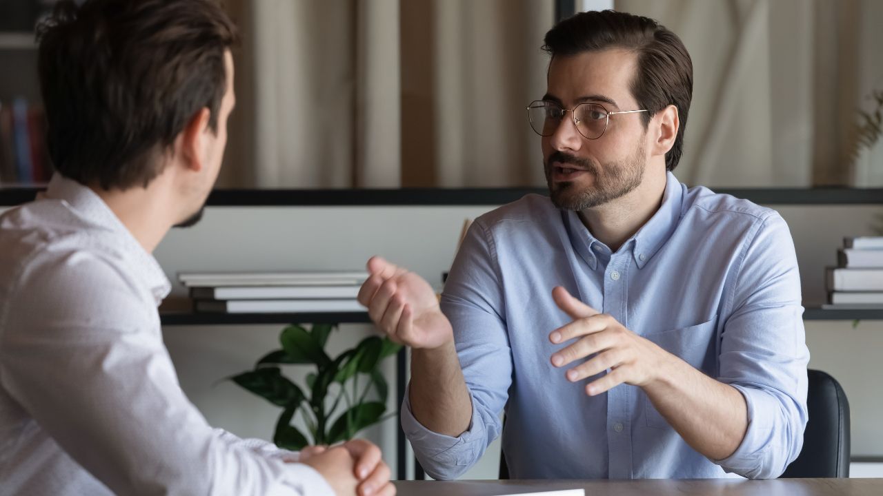 Young manager having a difficult conversation