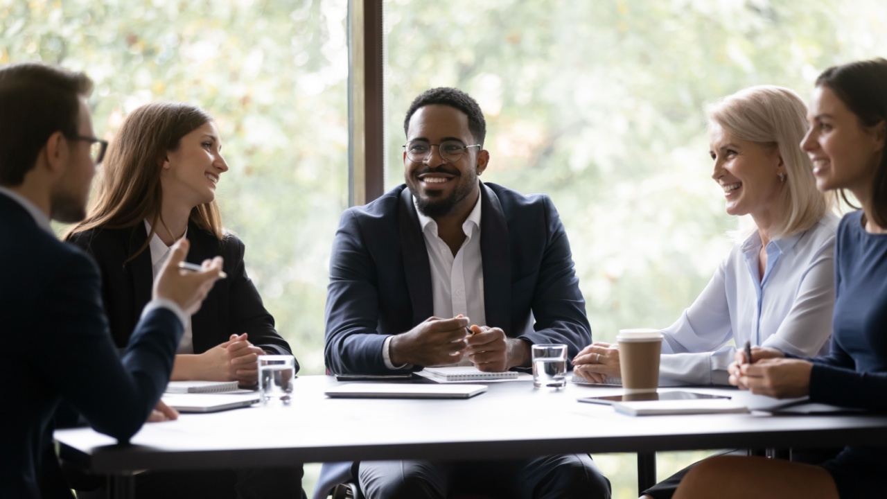 Diverse work group engaged in positive discussion